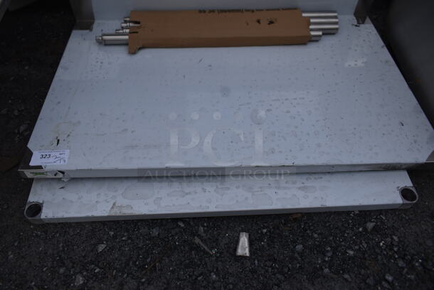 BRAND NEW SCRATCH AND DENT! Regency 600TSB3048S 30" x 48" 16-Gauge Stainless Steel Commercial Work Table with 4" Backsplash and Undershelf - Image 4 of 6