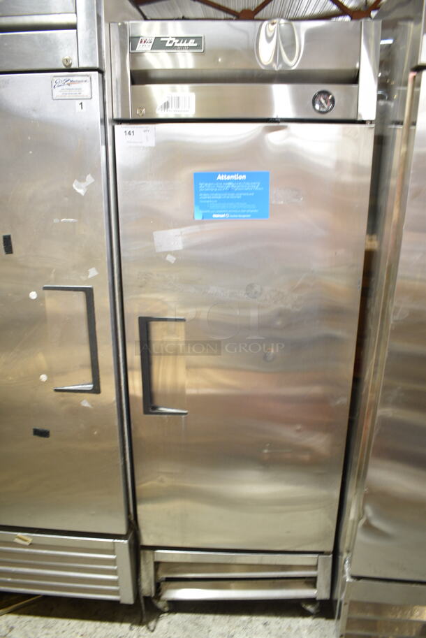 2017 True T-19F Stainless Steel Commercial Single Door Reach In Freezer w/ Poly Coated Racks on Commercial Casters. 115 Volts, 1 Phase. Cannot Test - Unit Trips Breaker - Image 1 of 5
