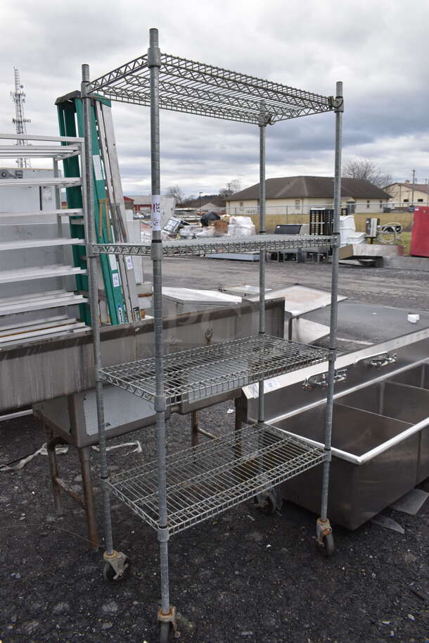 Gray Finish 4 Tier Shelving Unit on Commercial Casters. BUYER MUST DISMANTLE. PCI CANNOT DISMANTLE FOR SHIPPING. PLEASE CONSIDER FREIGHT CHARGES. 36x18x81 - Image 1 of 3