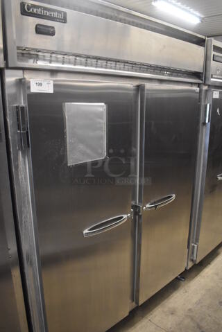 Continental 2FE Stainless Steel Commercial 2 Door Reach In Freezer on Commercial Casters. 115 Volts, 1 Phase. 57x34x82. Tested and Working!