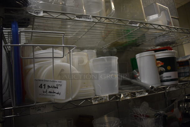 Chrome Finish 4 Tier Shelving Unit w/ Contents Including Poly Containers, Stainless Steel Bins and Stock Pot. 48x18x74. BUYER MUST REMOVE. BUYER MUST DISMANTLE. PCI CANNOT DISMANTLE FOR SHIPPING. PLEASE CONSIDER FREIGHT CHARGES. (kitchen) - Image 3 of 12