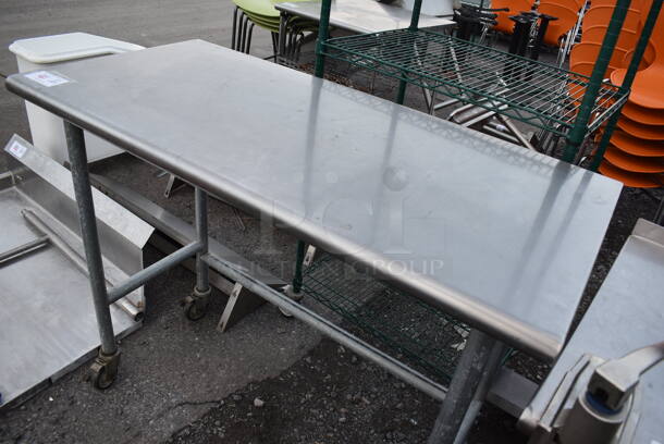 Stainless Steel Commercial Table on Commercial Casters. 48x24x40 - Image 2 of 4