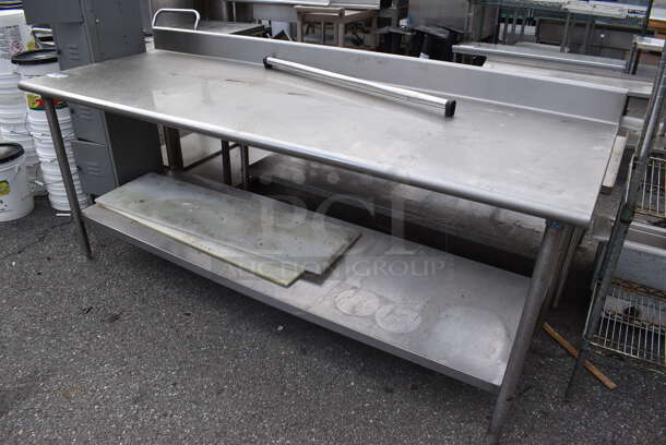 Stainless Steel Table w/ Back Splash and Metal Under Shelf.