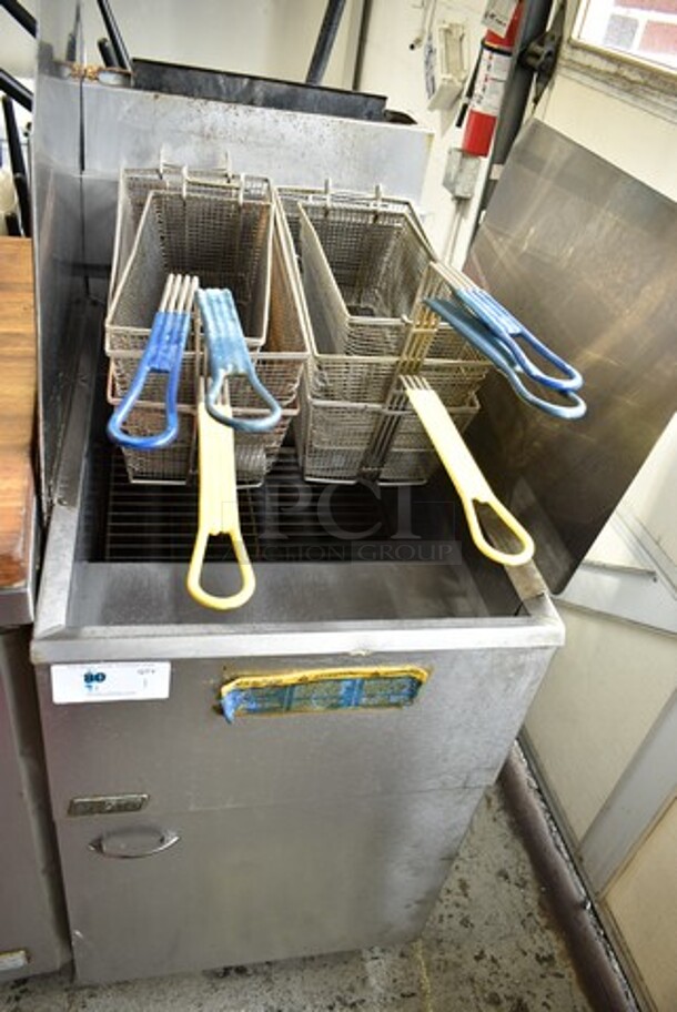 2019 Pitco Frialator 65C Stainless Steel Commercial Natural Gas Powered 65 Pound Capacity Deep Fat Fryer w/ 6 Metal Fry Baskets and Right Side Splash Guard. 150,000 BTU.  - Image 1 of 5