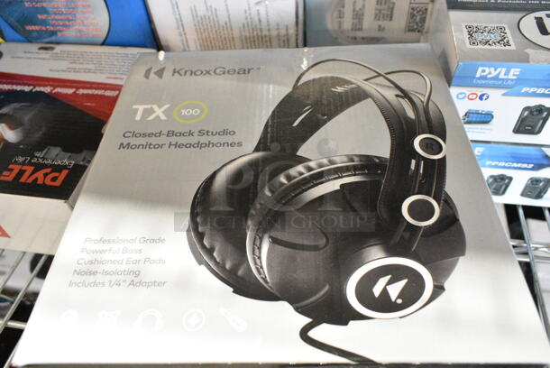12 IN ORIGINAL BOX! Items Including 2 Pyle PPBCM92 HD Body Camera, Knox Gear TX 100 Closed Back Studio Monitor Headphones, Pyle PLBLSP40 Back Up Camera, SereneLife Electric Air Pump Compressor Air Inflator, Pyle PLIO90BL High Power Subwoofer,  Pyle Desktop USB Podcast Microphone Kit PDMIKT140, 2 Pyle PL63BL Speakers Blue, Pyle PMXU83BT 8-Channel Bluetooth Studio Mixer, SereneLife SLSBIN21 Security Locking Storage Container Bin, Honeywell 4 Liter Mini Fridge, Windowfan. 12 Times Your Bid!  - Image 3 of 12