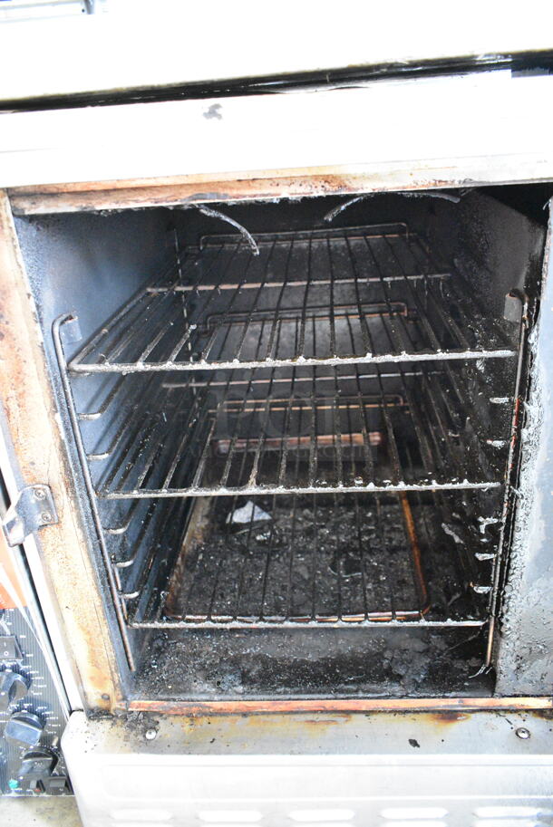 Blodgett Stainless Steel Commercial Natural Gas Powered Half Size Convection Oven w/ View Through Door, Metal Oven Racks, Thermostatic Controls and Equipment Stand on Commercial Casters. Missing 1 Caster. - Image 6 of 11
