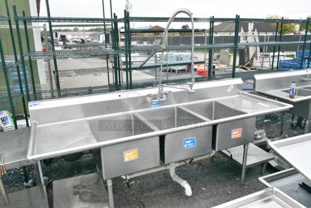 Stainless Steel Commercial 3 Bay Sink w/ Dual Drain Boards, Under Shelf, Faucet, Handles and Spray Nozzle Attachment. Bays 20x28x12. Drain Board 18x30 - Image 1 of 12