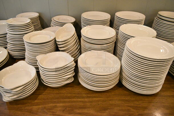 Wood Pattern Dining Height Table w/ Contents Including Ceramic Dishes. (main dining room) - Image 2 of 4
