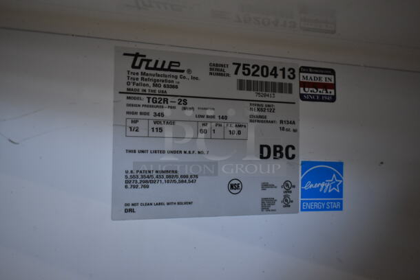 2013 True TG2R-2S ENERGY STAR Stainless Steel Commercial 2 Door Reach In Cooler w/ Poly Coated Racks on Commercial Casters. 115 Volts, 1 Phase. Tested and Working! - Image 7 of 8