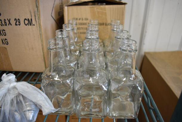 24 BRAND NEW! Condiment Bottles w/ Lids. 2x2x5. 24 Times Your Bid!