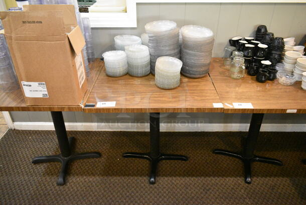 Wood Pattern Dining Height Table w/ Contents Including Clear Salad Plates. (main dining room) - Image 1 of 4