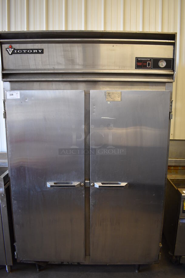 Victory Model RA-2D-7 Stainless Steel Commercial 2 Door Reach In Cooler. 115 Volts, 1 Phase. 52x36x84. Tested and Powers On But Temps at 45 Degrees