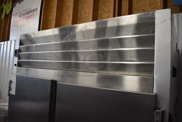 Traulsen Model G20000MC Stainless Steel Commercial 4 Half Size Door Reach In Cooler w/ Poly Coated Racks on Commercial Casters. 115 Volts, 1 Phase. 52x35x84. Tested and Working! - Image 8 of 10