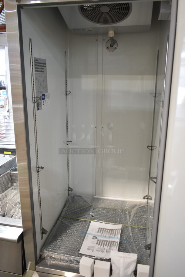 BRAND NEW SCRATCH AND DENT! 2023 Avantco 178A23RHC Stainless Steel Commercial Single Door Reach In Cooler w/ Poly Coated Racks on Commercial Casters. 115 Volts, 1 Phase. Tested and Working! - Image 6 of 8