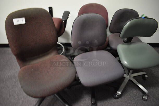  6 office chairs in a variety of colors.  6 Times Your Bid! (Main Building)