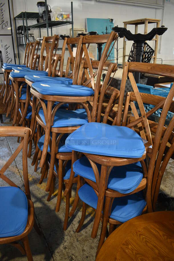 4 Wooden Dining Chairs w/ Blue Seat Cushion. Stock Picture - Cosmetic Condition May Vary. 20x18x35. 4 Times Your Bid! - Image 3 of 4
