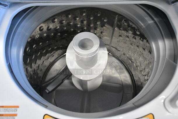 General Electric GE GUD27GSSMWW Gas Stacked Laundry Center with 3.8-cu ft Washer and 5.9-cu ft Dryer.  - Image 7 of 8