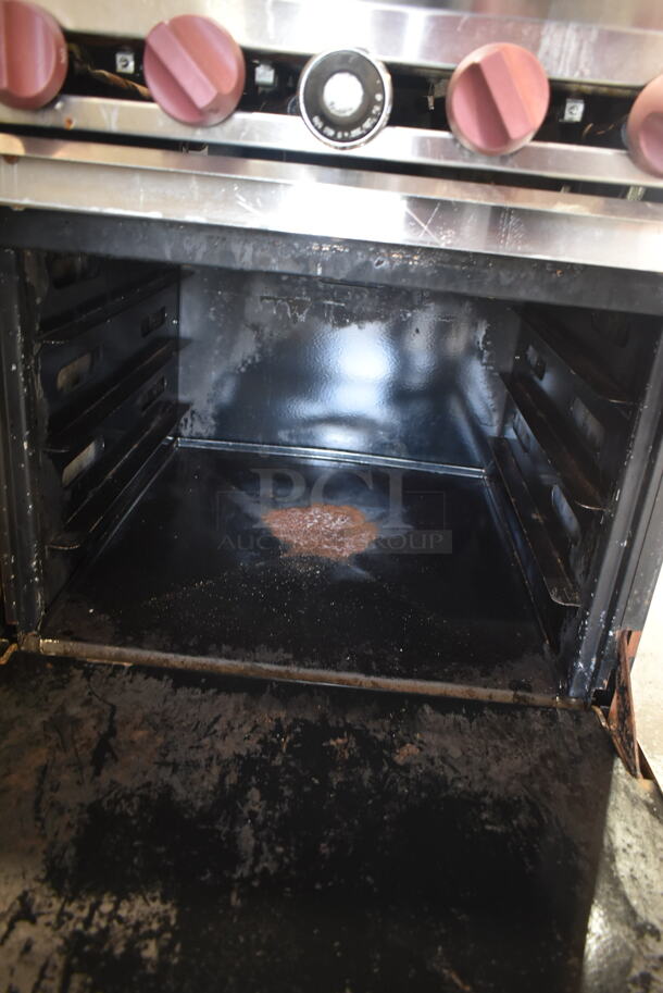 Dynamic Cooking Systems DCS Stainless Steel Commercial Gas Powered 4 Burner Range w/ Oven, Back Splash and Removable Cutting Board.  - Image 6 of 7