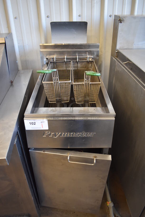 Frymaster FG14SD Stainless Steel Commercial Floor Style Propane Gas Powered Deep Fat Fryer w/ 2 Metal Fry Baskets on Commercial Casters. 15.5x31x51