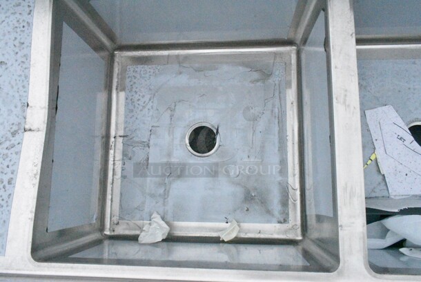 BRAND NEW SCRATCH AND DENT! Regency 600S32424224 Spec Line 124" 14 Gauge Stainless Steel Three Compartment Commercial Sink with 2 Drainboards - 24" x 24" x 14" Bowls. No Legs.  - Image 8 of 10