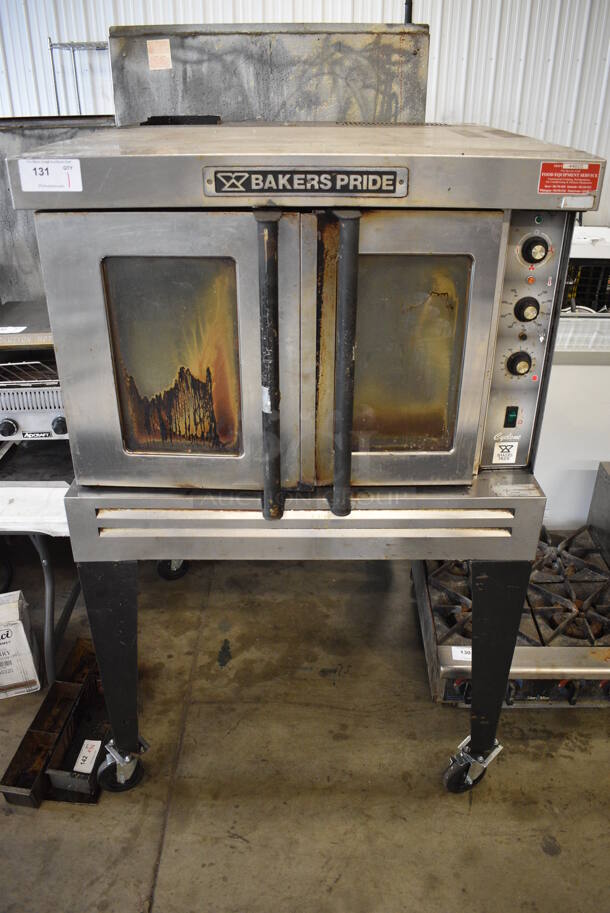 Baker's Pride Stainless Steel Commercial Natural Gas Powered Full Size Convection Oven w/ View Through Doors, Metal Oven Racks and Thermostatic Controls on Metal Legs and Commercial Casters. 39x39x64