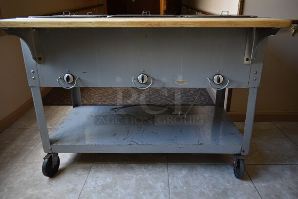 Stainless Steel Commercial 3 Well Steam Table w/ Butcher Block Cutting Board and Under Shelf on Commercial Casters. Tested and Does Not Power On. (front hallway) - Image 2 of 7