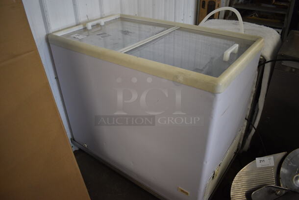 Model ISL 11 Metal Commercial Chest Freezer Merchandiser on Commercial Casters. 120 Volts, 1 Phase. 41x25x38. Tested and Working!