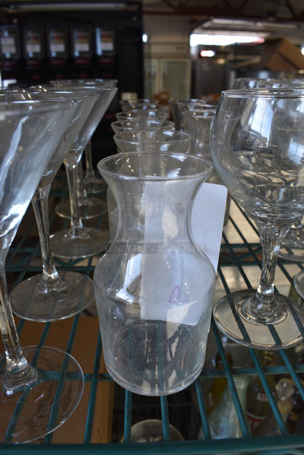 9 Beverage Glasses. 2.5x2.5x5. 9 Times Your Bid!