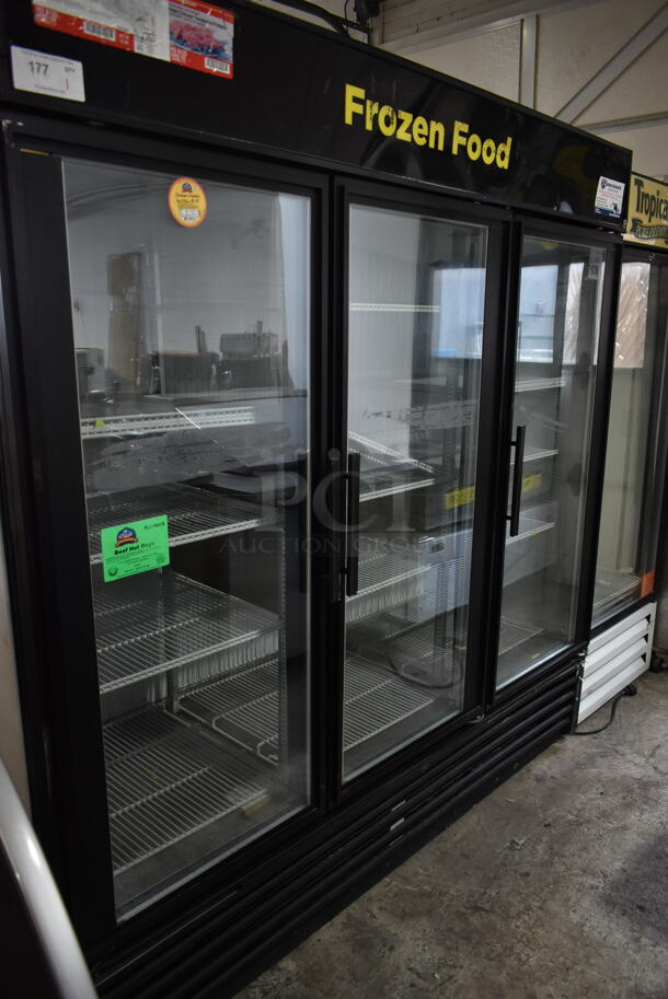 True GDM-72F Metal Commercial 3 Door Reach In Freezer Merchandiser w/ Poly Coated Racks. 115/208-230 Volts, 1 Phase. 