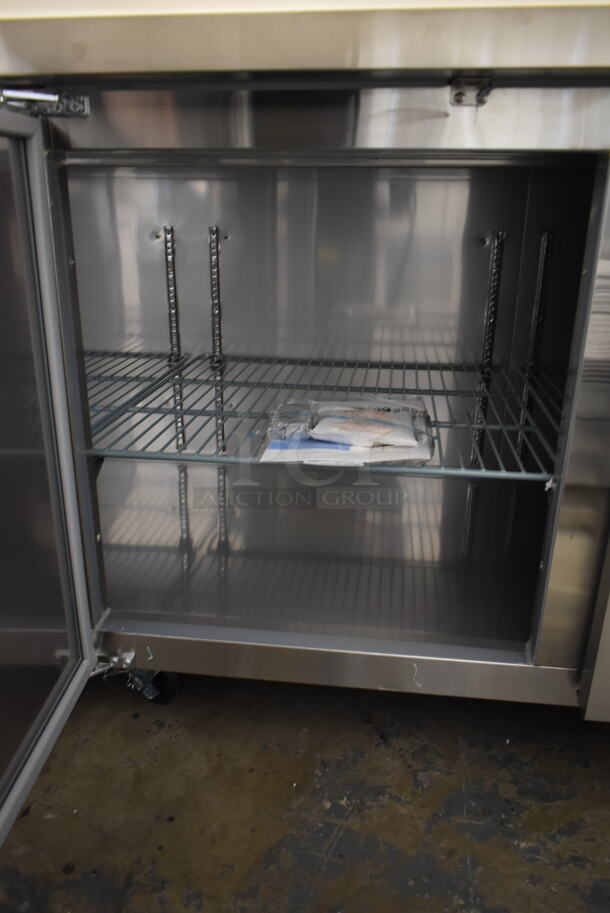 BRAND NEW SCRATCH AND DENT! 2023 Avantco 178SSPPT3 Stainless Steel Commercial Pizza Prep Table on Commercial Casters. 115 Volts, 1 Phase. Tested and Working! - Image 8 of 11