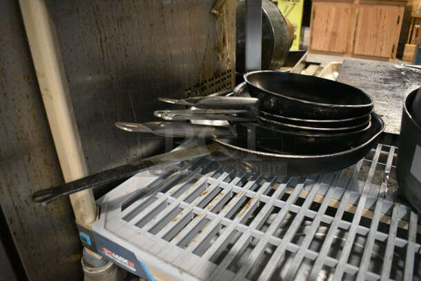 5 Various Metal Skillets. Includes 18x10.5x2. 5 Times Your Bid!