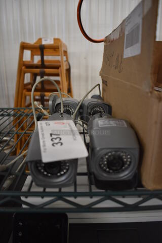 4 Qsee QD6508B-4H Color Cameras. 2.5x2.5x7. 4 Times Your Bid!