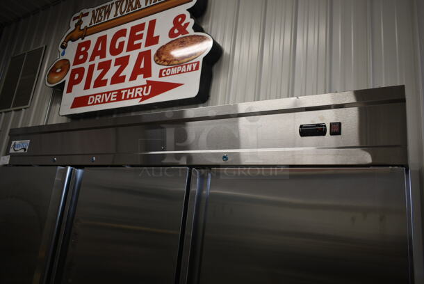 BRAND NEW SCRATCH AND DENT! 2023 Avantco 178SS3FHC Stainless Steel Commercial 3 Door Reach In Freezer w/ Poly Coated Racks on Commercial Casters. 115 Volts, 1 Phase. Tested and Working! - Image 2 of 11