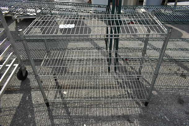 Chrome Finish 3 Tier Wire Shelving Unit. BUYER MUST DISMANTLE. PCI CANNOT DISMANTLE FOR SHIPPING. PLEASE CONSIDER FREIGHT CHARGES.
 - Image 1 of 2