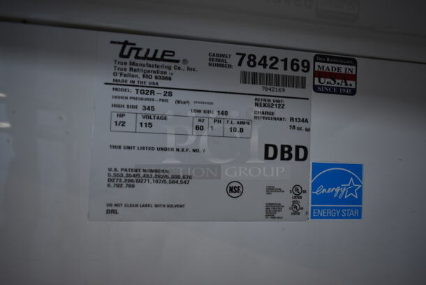 2013 True TG2R-2S ENERGY STAR Stainless Steel Commercial 2 Door Reach In Cooler w/ Poly Coated Racks on Commercial Casters. 115 Volts, 1 Phase. Tested and Working! - Image 7 of 8