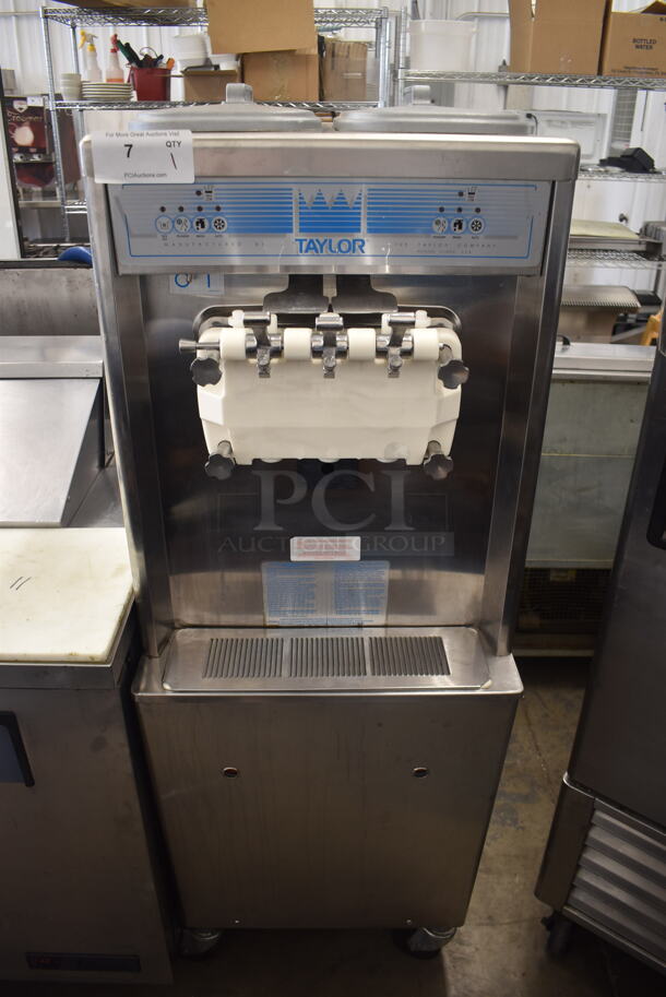 2010 Taylor 794-33 Commercial Stainless Steel Soft Serve Water Cooled Ice Cream Machine With 2 Hoppers On Commercial Casters. 208-230V, 3 Phase. 