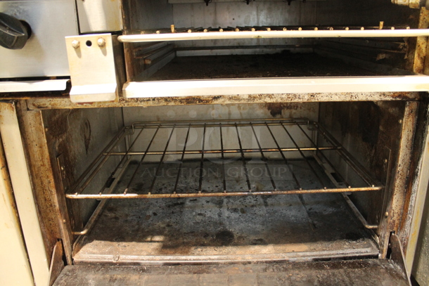 Garland X60-6R24RR Stainless Steel Commercial Natural Gas Powered 6 Burner Range w/ Right Side Flat Top Griddle, 2 Ovens, Back Splash and Over Shelf. - Image 7 of 10