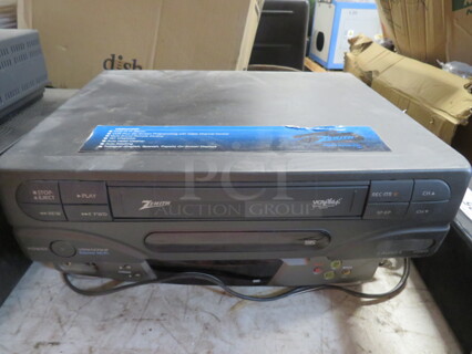 One Zenith VHS Player.