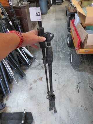 One Tripod Stand.