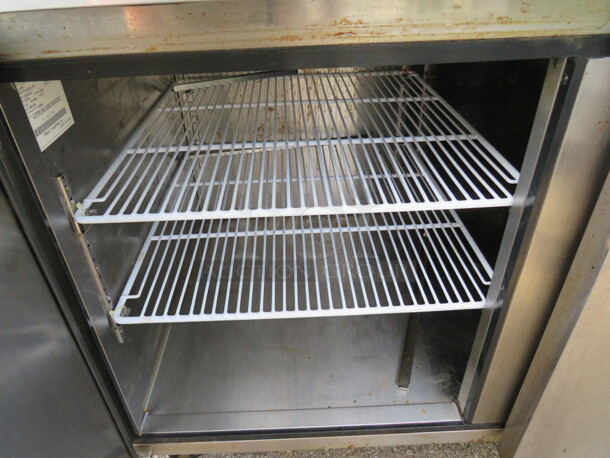 One WORKING Stainless Steel Migali 2 Door Refrigerated Prep Table With 2 Racks On Casters. 115 Volt. Model# CPP67. 67X33X44 - Image 3 of 3