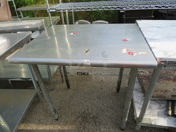 One Stainless Steel Table. 36X30X35