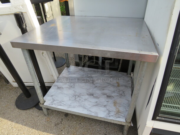 One Stainless Steel Table With Under Shelf. 36X30X35