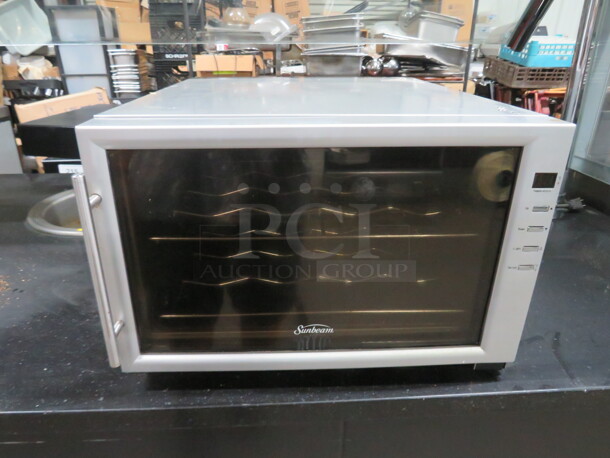 One WORKING Sunbeam Table Top Wine Cooler. Model# SCN085HCBV. 110 Volt. 16.5X21X11.  - Image 1 of 1
