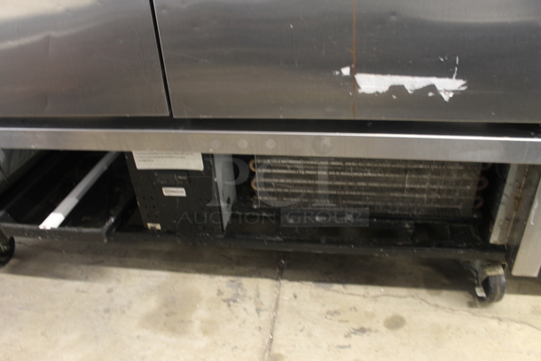 2013 True T-49F ENERGY STAR Stainless Steel Commercial 2 Door Reach In Freezer w/ Poly Coated Racks on Commercial Casters. 115 Volts, 1 Phase. Tested and Working! - Image 4 of 7