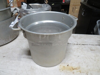 One Aluminum Stock Pot. 11X10