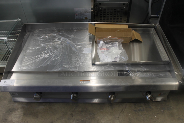 BRAND NEW SCRATCH AND DENT! Cooking Performance Group CPG 351GTCPG48NL Stainless Steel Commercial Countertop Natural Gas Powered Flat Top Griddle. 120,000 BTU. - Image 1 of 5