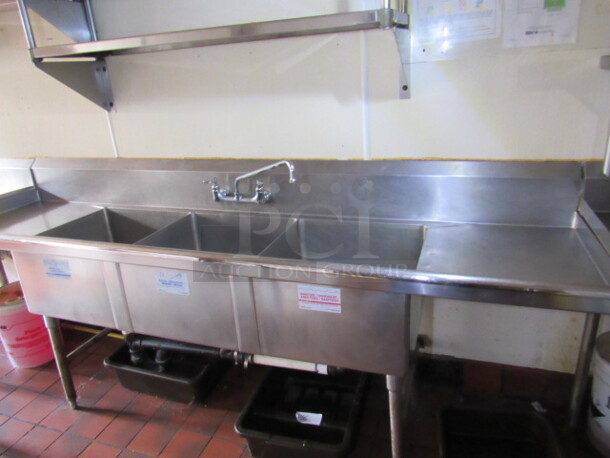 One Stainless Steel Triple Bowl Sink With R/L Drain Boards, And Faucet. Sink-20X20X12. 98X27X40. BUYER MUST REMOVE!