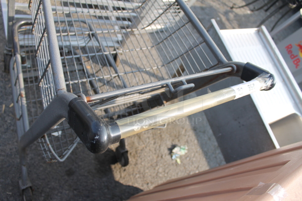 Commercial Two-Tier Metal Express Shopping Cart With Third Basket on Commercial Casters.  - Image 4 of 6