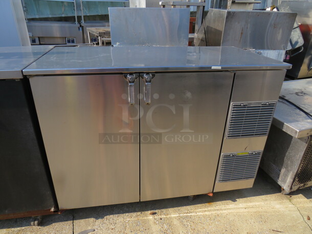 One Stainless Steel Glastender Back Bar Cooler With 2 Racks On Casters. Model# ND52-R1-SS. 115 Volt.  - Image 1 of 1