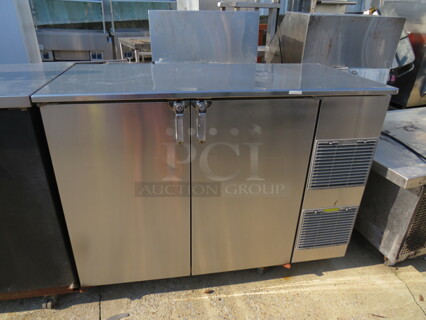 One Stainless Steel Glastender Back Bar Cooler With 2 Racks On Casters. Model# ND52-R1-SS. 115 Volt. 